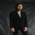 Hoe combineer je een oversized blazer zonder vormverlies?